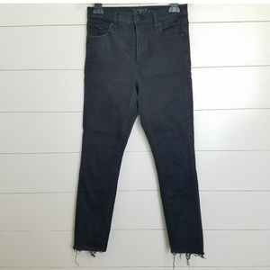 REPOSH! Lucky brand black skinny jeans with distressed hem.